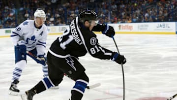 Mar 28, 2016; Tampa, FL, USA; Tampa Bay Lightning center Jonathan Marchessault (81) shoots as Toronto Maple Leafs right wing Michael Grabner (40) defends during the second period at Amalie Arena. Mandatory Credit: Kim Klement-USA TODAY Sports
