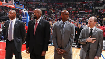 LOS ANGELES, CA - MARCH 27: Doc Rivers, Mike Woodson, Sam Cassell and Lawrence Frank of the Los Angeles Clippers stand on the court before the game against the Denver Nuggets at STAPLES Center on March 27, 2016 in Los Angeles, California. NOTE TO USER: User expressly acknowledges and agrees that, by downloading and/or using this Photograph, user is consenting to the terms and conditions of the Getty Images License Agreement. Mandatory Copyright Notice: Copyright 2016 NBAE (Photo by Andrew D. Bernstein/NBAE via Getty Images)