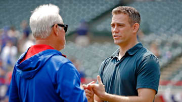 CHICAGO, IL - JULY 03: Chicago Cubs President of Baseball Operations Theo Epstein talks with manager Joe Maddon #70 before the game against the Miami Marlins at Wrigley Field on July 3, 2015 in Chicago, Illinois. (Photo by Jon Durr/Getty Images)