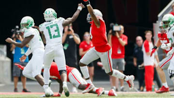 Ohio State Buckeyes defensive end Javontae Jean-Baptiste (8) pressures Oregon Ducks quarterback Anthony Brown (13) during the second half of the NCAA football game at Ohio Stadium in Columbus on Saturday, Sept. 11, 2021.Oregon Ducks At Ohio State Buckeyes Football