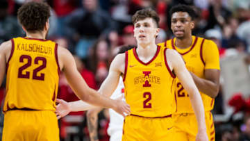 LUBBOCK, TEXAS - JANUARY 30: Guard Caleb Grill #2 of the Iowa State Cyclones high fives guard Gabe Kalscheur #22 during the second half of the college basketball game against the Texas Tech Red Raiders at United Supermarkets Arena on January 30, 2023 in Lubbock, Texas. (Photo by John E. Moore III/Getty Images)