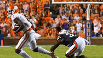Sep 3, 2016; Auburn, AL, USA; Clemson Tigers wide receiver Mike Williams (7) runs the ball while defended by Auburn Tigers defensive back Javaris Davis (31) during the first half at Jordan Hare Stadium. Mandatory Credit: Shanna Lockwood-USA TODAY Sports