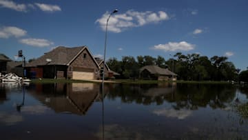 RICHWOOD, TX - SEPTEMBER 07: Floodwaters surround homes on September 7, 2017 in Richwood, Texas. Over a week after Hurricane Harvey hit Southern Texas, residents are beginning the long process of recovering from the storm. (Photo by Justin Sullivan/Getty Images)
