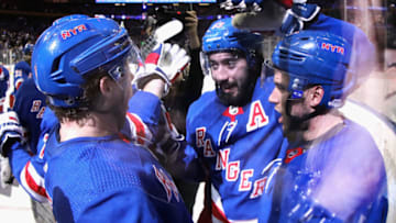 NEW YORK, NEW YORK - MARCH 05: Brendan Lemieux #48, Mika Zibanejad #93 and Tony DeAngelo #77 of the New York Rangers celebrate a 5-4 overtime victory over the Washington Capitals at Madison Square Garden on March 05, 2020 in New York City. (Photo by Bruce Bennett/Getty Images)