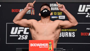 LAS VEGAS, NEVADA - FEBRUARY 12: In this handout provided by UFC, Kelvin Gastelum poses on the scale during the UFC weigh-in at UFC APEX on February 12, 2021 in Las Vegas, Nevada. (Photo by Jeff Bottari/Zuffa LLC via Getty Images)