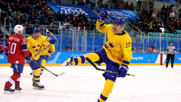 GANGNEUNG, SOUTH KOREA - FEBRUARY 15: Par Lindholm #17 of Sweden celebrates after scoring the opening goal during the Men's Ice Hockey Preliminary Round Group C game between Norway and Sweden on day six of the PyeongChang 2018 Winter Olympic Games at Gangneung Hockey Centre on February 15, 2018 in Gangneung, South Korea. (Photo by Bruce Bennett/Getty Images)