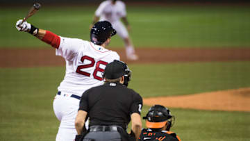 BOSTON, MA - JULY 24: J.D. Martinez #28 of the Boston Red Sox hits a two run RBI double in the fourth inning against the Baltimore Orioles on Opening Day at Fenway Park on July 24, 2020 in Boston, Massachusetts. The 2020 season had been postponed since March due to the COVID-19 pandemic. (Photo by Kathryn Riley/Getty Images)