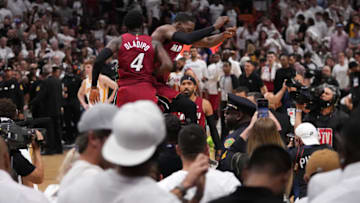 Miami Heat center Bam Adebayo (13) and Miami Heat guard Victor Oladipo (4) celebrate after defeating the Atlanta Hawks in game five( Jasen Vinlove-USA TODAY Sports)