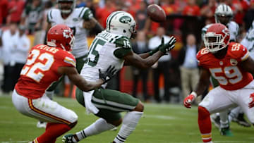 Sep 25, 2016; Kansas City, MO, USA; New York Jets wide receiver Brandon Marshall (15) is unable to catch this pass while defended by Kansas City Chiefs cornerback Marcus Peters (22) and inside linebacker Justin March-Lillard (59) in the first half at Arrowhead Stadium. Mandatory Credit: John Rieger-USA TODAY Sports
