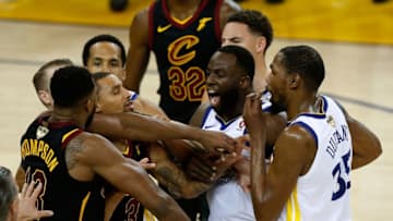 OAKLAND, CA - MAY 31: Tristan Thompson #13 of the Cleveland Cavaliers and Draymond Green #23 of the Golden State Warriors exchange words in overtime during Game 1 of the 2018 NBA Finals at ORACLE Arena on May 31, 2018 in Oakland, California. NOTE TO USER: User expressly acknowledges and agrees that, by downloading and or using this photograph, User is consenting to the terms and conditions of the Getty Images License Agreement. (Photo by Lachlan Cunningham/Getty Images)