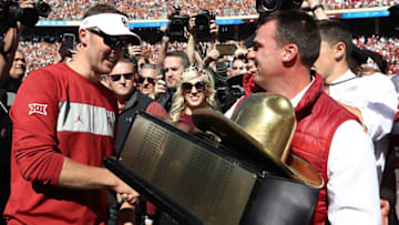 DALLAS, TEXAS - OCTOBER 12: Head coach Lincoln Riley of the Oklahoma Sooners accepts the Goldent Hat trophy after defeating the Texas Longhorns during the 2019 AT&T Red River Showdown at Cotton Bowl on October 12, 2019 in Dallas, Texas. (Photo by Ronald Martinez/Getty Images)
