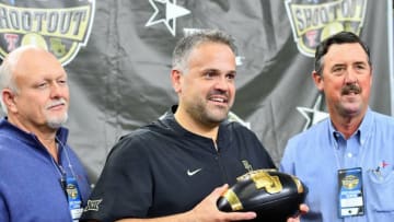 LUBBOCK, TX - NOVEMBER 24: Head coach Matt Rhule of the Baylor Bears is presented the Shootout trophy for winning the game against the Texas Tech Red Raiders on November 24, 2018 at AT&T Stadium in Arlington, Texas. Baylor defeated Texas Tech 35-24. (Photo by John Weast/Getty Images)