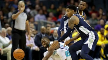 CHARLOTTE, NC - OCTOBER 25: Kemba Walker #15 of the Charlotte Hornets and Gary Harris #14 of the Denver Nuggets go after a ball during their game at Spectrum Center on October 25, 2017 in Charlotte, North Carolina. NOTE TO USER: User expressly acknowledges and agrees that, by downloading and or using this photograph, User is consenting to the terms and conditions of the Getty Images License Agreement. (Photo by Streeter Lecka/Getty Images)