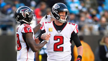 Nov 17, 2019; Charlotte, NC, USA; Atlanta Falcons quarterback Matt Ryan (2) reacts with wide receiver Calvin Ridley (18) in the third quarter at Bank of America Stadium. Mandatory Credit: Bob Donnan-USA TODAY Sports