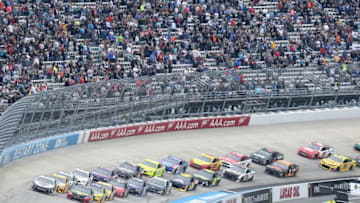 DOVER, DE - MAY 06: Kevin Harvick, driver of the #4 Jimmy John's Ford, and Clint Bowyer, driver of the #14 Haas Automation Demo Day Ford, restart the field during the Monster Energy NASCAR Cup Series AAA 400 Drive for Autism at Dover International Speedway on May 6, 2018 in Dover, Delaware. (Photo by Jerry Markland/Getty Images)