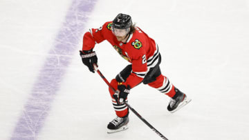 Apr 23, 2021; Chicago, Illinois, USA; Chicago Blackhawks defenseman Duncan Keith (2) looks to pass the puck against the Nashville Predators during the first period at United Center. Mandatory Credit: Kamil Krzaczynski-USA TODAY Sports