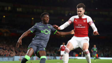 LONDON, ENGLAND - NOVEMBER 08: Carl Jenkinson of Arsenal and Abdoulay Diaby of Sporting CP battle for the ball during the UEFA Europa League Group E match between Arsenal and Sporting CP at Emirates Stadium on November 8, 2018 in London, United Kingdom. (Photo by Clive Rose/Getty Images)