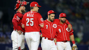 MONTERREY, MEX - APRIL 13: Eugenio Suarez #7 and Jose Peraza #9 of the Cincinnati Reds look on during a pitching change during the game between the St. Louis Cardinals and the Cincinnati Reds at Estadio de Beisbol Monterrey on Saturday, April 13, 2019 in Monterrey, Nuevo Leon, Mexico. (Photo by Alex Trautwig/MLB via Getty Images)