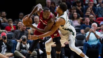 Miami Heat center Bam Adebayo (13) looks for an open teammate as Milwaukee Bucks forward Giannis Antetokounmpo (34) blocks in the fourth quarter on Sunday, Jan. 14, 2018 at the AmericanAirlines Arena in Miami, Fla. (Matias J. Ocner/Miami Herald/TNS via Getty Images)