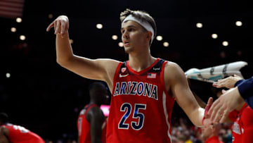 TUCSON, ARIZONA - JANUARY 29: Kerr Kriisa #25 of the Arizona Wildcats reacts after the Wildcats beat the Arizona State Sun Devils 67-56 at McKale Center on January 29, 2022 in Tucson, Arizona. (Photo by Chris Coduto/Getty Images)