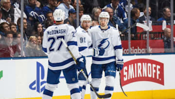 TORONTO, ON - APRIL 4: Steven Stamkos #91 of the Tampa Bay Lightning celebrates his goal against the Toronto Maple Leafs with team-mates Ryan McDonagh #27 and Anthony Cirelli #71 during the second period at the Scotiabank Arena on April 4, 2019 in Toronto, Ontario, Canada. (Photo by Kevin Sousa/NHLI via Getty Images)