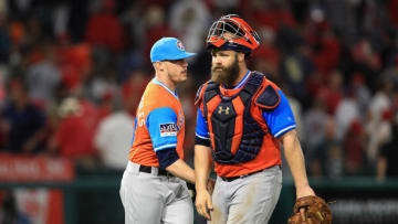 ANAHEIM, CA - AUGUST 25: Evan Gattis #11 and Ken Giles #53 of Houston Astros react after defeating the Los Angeles Angels of Anaheim 2-1 in a game at Angel Stadium of Anaheim on August 25, 2017 in Anaheim, California. (Photo by Sean M. Haffey/Getty Images)