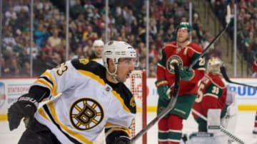 Feb 13, 2016; Saint Paul, MN, USA; Boston Bruins forward Brad Marchand (63) celebrates his goal in the first period against the Minnesota Wild at Xcel Energy Center. Mandatory Credit: Brad Rempel-USA TODAY Sports