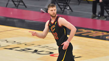 CLEVELAND, OHIO - MARCH 21: Dean Wade #32 of the Cleveland Cavaliers celebrates after scoring during the second quarter against the Toronto Raptors at Rocket Mortgage Fieldhouse on March 21, 2021 in Cleveland, Ohio. NOTE TO USER: User expressly acknowledges and agrees that, by downloading and/or using this photograph, user is consenting to the terms and conditions of the Getty Images License Agreement. (Photo by Jason Miller/Getty Images)