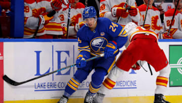 Oct 19, 2023; Buffalo, New York, USA; Buffalo Sabres center Dylan Cozens (24) looks for the puck during the third period against the Calgary Flames at KeyBank Center. Mandatory Credit: Timothy T. Ludwig-USA TODAY Sports
