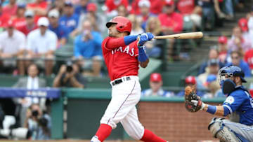 Oct 7, 2016; Arlington, TX, USA; Texas Rangers center fielder Ian Desmond (20) doubles against the Toronto Blue Jays during the seventh inning of game two of the 2016 ALDS playoff baseball series at Globe Life Park in Arlington. Mandatory Credit: Kevin Jairaj-USA TODAY Sports
