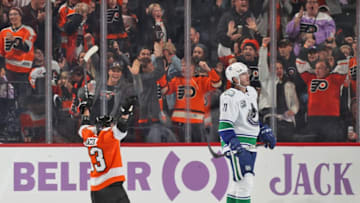 PHILADELPHIA, PA - NOVEMBER 25: Jakub Voracek #93 of the Philadelphia Flyers celebrates his third period goal against Zack MacEwen #71 of the Vancouver Canucks while on his knees on November 25, 2019 at the Wells Fargo Center in Philadelphia, Pennsylvania. (Photo by Len Redkoles/NHLI via Getty Images)