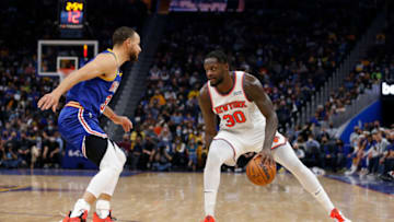 SAN FRANCISCO, CALIFORNIA - FEBRUARY 10: Julius Randle #30 of the New York Knicks dribbles the ball in the second quarter against the Golden State Warriors at Chase Center on February 10, 2022 in San Francisco, California. NOTE TO USER: User expressly acknowledges and agrees that, by downloading and/or using this photograph, User is consenting to the terms and conditions of the Getty Images License Agreement. (Photo by Lachlan Cunningham/Getty Images)