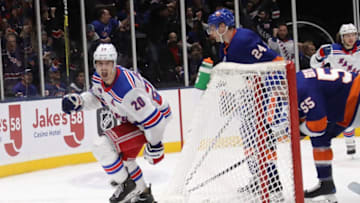 Chris Kreider #20 of the New York Rangers scores game winning goal