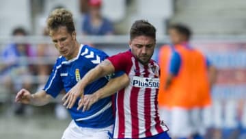 OVIEDO, SPAIN - JULY 28: Guilherme Siqueira of Club Atletico de Madrid duels for the ball with Susaeta of Real Oviedo during a pre season friendly match between Real Oviedo and Club Atletico de Madrid at Carlos Tartiere on July 28, 2015 in Oviedo, Spain. (Photo by Juan Manuel Serrano Arce/Getty Images)