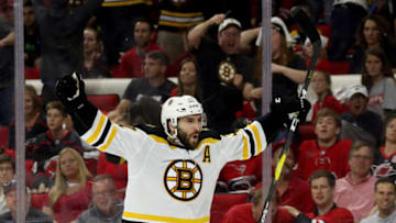 RALEIGH, NORTH CAROLINA - MAY 16: Patrice Bergeron #37 of the Boston Bruins celebrates after scoring a goal on Curtis McElhinney #35 of the Carolina Hurricanes during the third period in Game Four of the Eastern Conference Finals during the 2019 NHL Stanley Cup Playoffs at PNC Arena on May 16, 2019 in Raleigh, North Carolina. (Photo by Bruce Bennett/Getty Images)