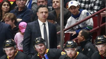 VANCOUVER, BC - NOVEMBER 16: Head coach Travis Green of the Vancouver Canucks looks on from the bench during their NHL game against the Colorado Avalanche at Rogers Arena November 16, 2019 in Vancouver, British Columbia, Canada. Colorado won 5-4. (Photo by Jeff Vinnick/NHLI via Getty Images)