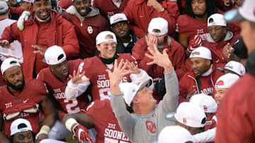 Dec 3, 2016; Norman, OK, USA; The Oklahoma Sooners celebrate winning the Big 12 Conference Championship after defeating the Oklahoma State Cowboys at Gaylord Family - Oklahoma Memorial Stadium. Mandatory Credit: Mark D. Smith-USA TODAY Sports