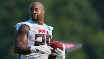 Jul 29, 2021; Flowery Branch, GA, USA; Atlanta Falcons running back Mike Davis (28) runs with the ball on the field during the first day of training camp at the Atlanta Falcons Training Facility. Mandatory Credit: Dale Zanine-USA TODAY Sports