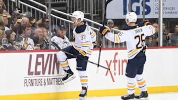 PITTSBURGH, PA - NOVEMBER 19: Casey Mittelstadt #37 of the Buffalo Sabres reacts after scoring a goal during the third period in the game against the Pittsburgh Penguins at PPG PAINTS Arena on November 19, 2018 in Pittsburgh, Pennsylvania. (Photo by Justin Berl/Getty Images)