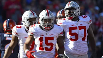 Nov 14, 2015; Champaign, IL, USA; Ohio State Buckeyes running back Ezekiel Elliott (15) celebrates with teammates after scoring a touchdown during the third quarter at Memorial Stadium. Mandatory Credit: Mike DiNovo-USA TODAY Sports