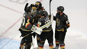 The Vegas Golden Knights celebrate with Robin Lehner after the teams 3-0 victory against the Vancouver Canucks in Game Seven of the Western Conference Second Round. (Photo by Bruce Bennett/Getty Images)