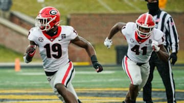 Adam Anderson and Channing Tindall (Photo By: Jay Biggerstaff-USA TODAY Sports)
