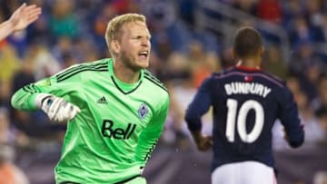 Jun 27, 2015; Foxborough, MA, USA; Whitecaps FC goalkeeper David Ousted (1) celebrates making a save during the second half of Whitecaps FC's 2-1 win over the New England Revolution at Gillette Stadium. Mandatory Credit: Winslow Townson-USA TODAY Sports
