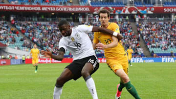 SOCHI, RUSSIA - JUNE 19: Antonio Ruediger of Germany and Robbie Kruse of Australia battle for possession during the FIFA Confederations Cup Russia 2017 Group B match between Australia and Germany at Fisht Olympic Stadium on June 19, 2017 in Sochi, Russia. (Photo by Buda Mendes/Getty Images)