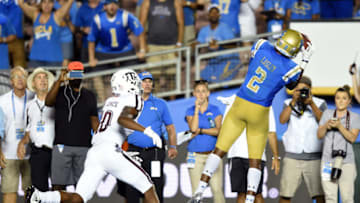PASADENA, CA - SEPTEMBER 03: UCLA (2) Jordan Lasley (WR) catches the game winning pass for a touchdown against Texas A