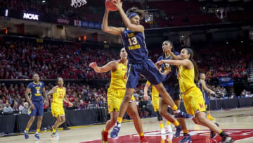 COLLEGE PARK, MD - MARCH 19: West Virginia Mountaineers forward Kristina King (13) pulls down a rebound during a Div. 1 NCAA Women's basketball 2nd. round game between Maryland and West Virginia on March 19, 2017, at Xfinity Center in College Park, Maryland. Maryland defeated West Virginia 83-56. (Photo by Tony Quinn/Icon Sportswire via Getty Images)