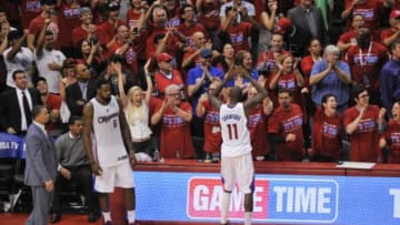 May 3, 2014; Los Angeles, CA, USA; Los Angeles Clippers guard Jamal Crawford (11) celebrates with fans during the fourth quarter against the Golden State Warriors in game seven of the first round of the 2014 NBA Playoffs at Staples Center. The Los Angeles Clippers defeated the Golden State Warriors 126-121. Mandatory Credit: Kelvin Kuo-USA TODAY Sports