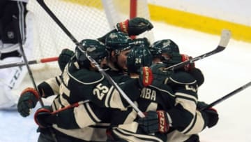 Apr 24, 2016; Saint Paul, MN, USA; Minnesota Wild celebrate the goal by forward Jason Pominville (29) during the third period against the Dallas Stars in game six of the first round of the 2016 Stanley Cup Playoffs at Xcel Energy Center. The Stars win 5-4 over the Wild. Mandatory Credit: Marilyn Indahl-USA TODAY Sports
