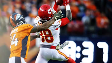 Nov 15, 2015; Denver, CO, USA; Kansas City Chiefs strong safety Ron Parker (38) intercepts a pass intended for Denver Broncos wide receiver Cody Latimer (14) during the second half at Sports Authority Field at Mile High. The Chiefs won 29-13. Mandatory Credit: Chris Humphreys-USA TODAY Sports