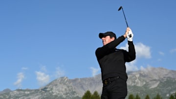 CRANS-MONTANA, SWITZERLAND - AUGUST 29: Rory McIlroy of Northern Ireland plays a shot on the twelfth during Day One of the Omega European Masters at Crans Montana Golf Club on August 29, 2019 in Crans-Montana, Switzerland. (Photo by Stuart Franklin/Getty Images)